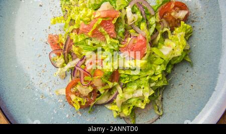 Essen für vegetarische Ernährung - Salat mit cherry Weinstock tomatoe und Grapefruit Stockfoto