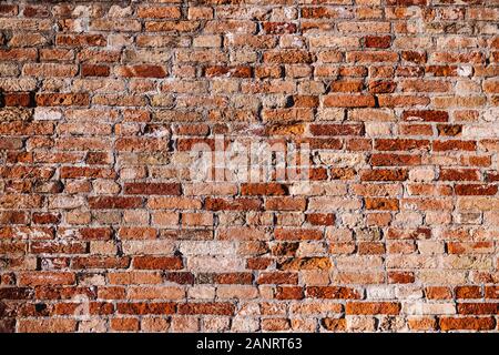 Red Old Brick Wall Textur loft grunge Hintergrund. Italienische Mauerwerk Stockfoto