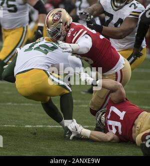 Santa Clara, USA. 19 Jan, 2020. San Francisco 49ers defensive Ende Nick Bosa (97) und defensiver entwalden Buckner (99) Sack Green Bay Packers Quarterback Aaron Rodgers (12) einen Verlust von 13 Yards im ersten Quartal des NFC-Meisterschaft an Levi's Stadion in San Jose, Kalifornien, an einem Sonntag, 19. Januar 2020. Foto von Terry Schmitt/UPI Quelle: UPI/Alamy leben Nachrichten Stockfoto