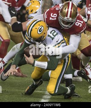 Santa Clara, USA. 19 Jan, 2020. Green Bay Packers Quarterback Aaron Rodgers (12) ist durch die San Francisco 49ers defensive Ende Arik Armstead (91) im vierten Quartal im NFC Championship an Levi's Stadion in San Jose, Kalifornien, an einem Sonntag, 19. Januar 2020 gekuendigt. Die 49ers besiegten die Green Bay Packers 37-20. Foto von Terry Schmitt/UPI Quelle: UPI/Alamy leben Nachrichten Stockfoto