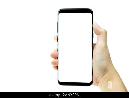Frau Hand schwarz Handy mit weißer Bildschirm im Hintergrund, Smartphone leerer Bildschirm Stockfoto