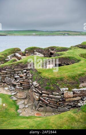 Skara Brae, ein Steinhaus neolithischen Dorf auf der Bucht Skaill an der Westküste von den Orkney-Inseln in Schottland. Stockfoto