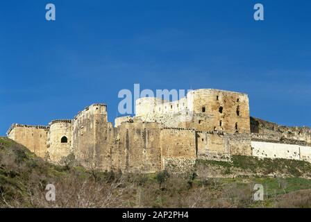 Syrien Arabische Republik. Krak des Chevaliers. Crusader Castle, die unter der Kontrolle des Johanniter Ritter (1142-1271) während der Kreuzzüge in das Heilige Land, fiel in die Arabischen Steuerung im 13. Jahrhundert. Foto vor dem syrischen Bürgerkrieg. Stockfoto