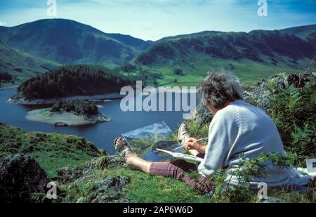 Künstler tun ein Ölgemälde, das Haweswater im Nationalpark Lake District, Cumbria, UK. Stockfoto