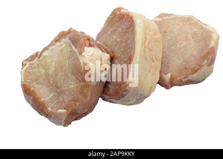 Geschnittenes rohes Schweinefleisch auf weißem Hintergrund. Ansicht von oben. Flach Stockfoto