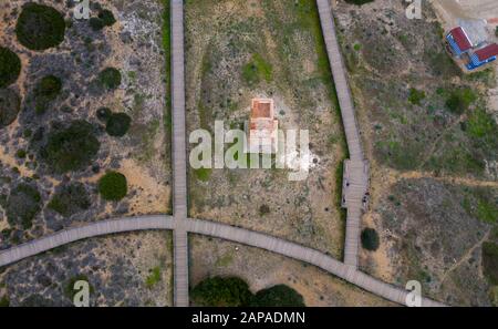 Alten Wachturm genannt torreladrones am Strand von Cabopino, Marbella Stockfoto