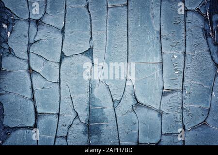Graues Holz- Hintergrund mit Alte bemalte Platten Stockfoto