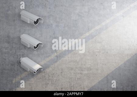 Drei Wandüberwachungskameras mit Sonnenlicht. 3D-Rendering Stockfoto