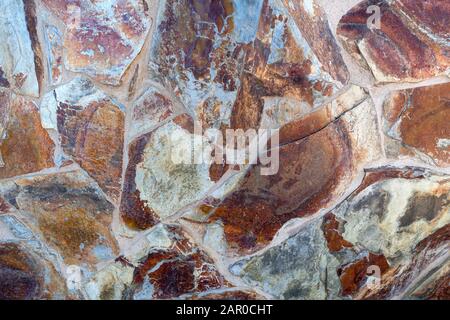 Detail einer Wandverkleidung aus Steinen Stockfoto