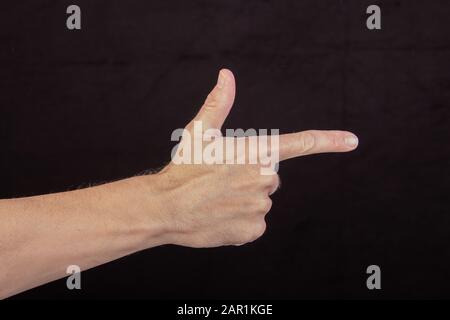 Hand zählt zwei, zwei Finger ausgestreckt, Schild für zwei Stockfoto