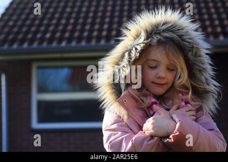 Portrait of a Girl in a Peaceful Moment in Colour Stockfoto