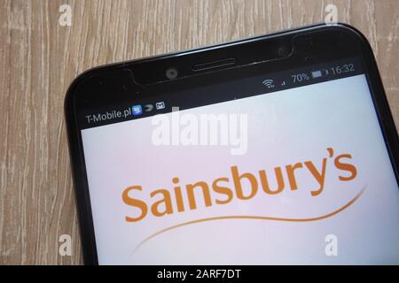 Sainsburys Logo wird auf einem modernen Smartphone angezeigt Stockfoto