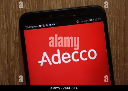 Das Logo der Adecco Group wird auf einem modernen Smartphone angezeigt Stockfoto