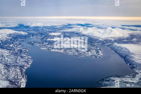 Flug über Tromsø und Nordnorwegen nach München Stockfoto