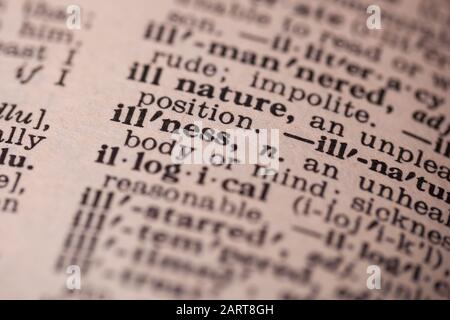 Woodbridge, NEW JERSEY/USA - 29. Januar 2020: Das Wort Krankheit wird in einem Vintage Webster's Dictionary hervorgehoben; illudative Editorial Stockfoto
