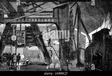 Der große Hammer, ein 30-Tonnen-Dampfhammer für schwere Schmiedearbeiten in den Werken von Armstrong Whitworth, Elswick, Produktionsbetrieb auf Tyneside, gegründet im Jahr 1847 von Ingenieur William George Armstrong (1810- 1900), einem englischen Ingenieur und industriellen. Sie stellte hydraulische Maschinen, Kräne und Brücken und später auch Artillerie her. Stockfoto