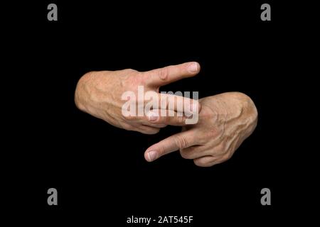 Die WORTPFLEGE in britischer Zeichensprache auf isoliertem schwarzem Hintergrund Stockfoto
