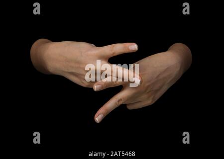 Die WORTPFLEGE in britischer Zeichensprache auf isoliertem schwarzem Hintergrund Stockfoto
