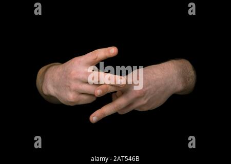 Die WORTPFLEGE in britischer Zeichensprache auf isoliertem schwarzem Hintergrund Stockfoto