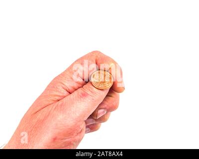 Geld kleine Münzen in einer Hand auf weißem Hintergrund. Euro. Cent. Geschäft. Platz für Text. Platz frei. Hintergrundbild. Stockfoto