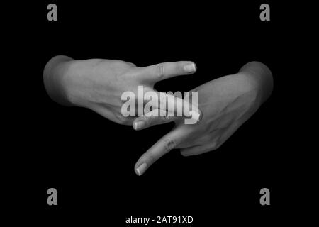 Die WORTPFLEGE in britischer Zeichensprache auf isoliertem schwarzem Hintergrund Stockfoto