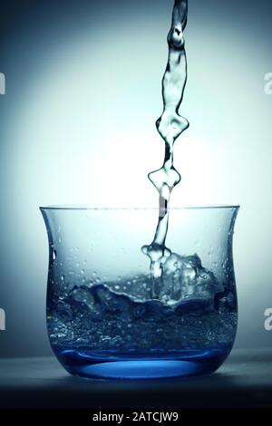 Wasserspritzfotografie Stockfoto