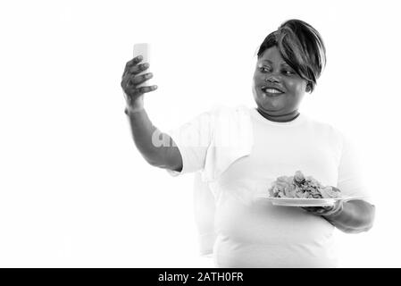 Studio Schuss von übergewichtiger Afrikanerin bereit für die Sporthalle Stockfoto