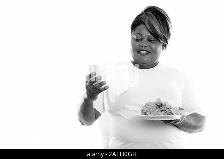 Studio Schuss von übergewichtiger Afrikanerin bereit für die Sporthalle Stockfoto