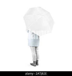 Frauen stehen nach hinten mit weißen leeren Regenschirm geöffnet mockup isoliert Stockfoto