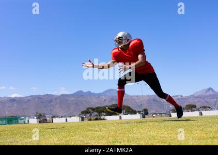Fußball-Football-Spieler Stockfoto