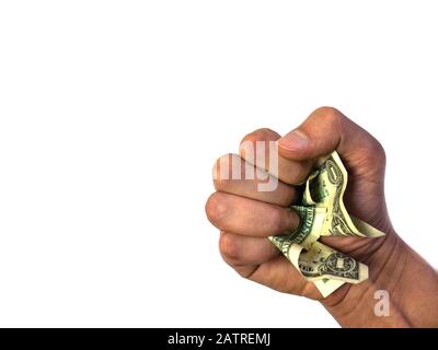 Die Hand hält und drückt die Dollar. Stockfoto