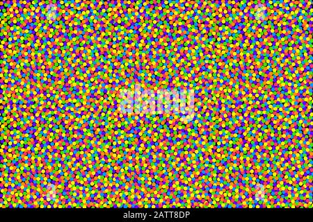 Farbenfroher Konfettihintergrund. Kleine Punkte in kräftigen und gesättigten Farben, zufällig über einen rechteckigen schwarzen Hintergrund verteilt, um nahtlos zu wirken. Stockfoto
