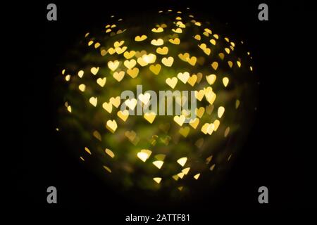 Herzförmiger Bokeh abstrakter Hintergrund Stockfoto