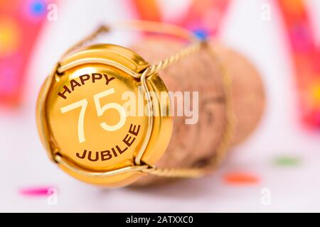 75-jähriges Jubiläum und Jubiläum mit Sekt Stockfoto