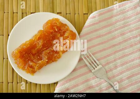 Konservierte Ananas thailändisches süßes Essen auf dem Teller Stockfoto