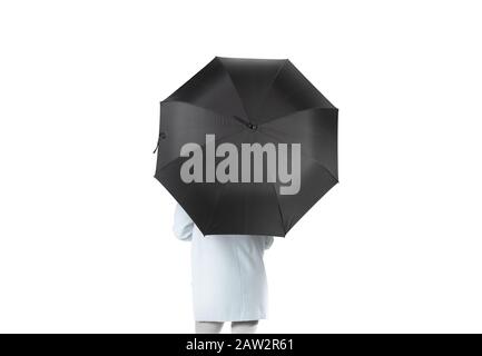 Frauen stehen nach hinten mit schwarz blanken Regenschirm geöffnet mockup Stockfoto