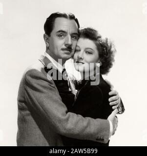 1941, HOLYWOOD, USA: Die Filmschauspielerinnen MYRNA LOY (* 1905; 1993) und WILLIAM POWELL (* 1892; † 1984), Pubblität noch für FILMSCHATTEN DER DÜNNEN Stockfoto