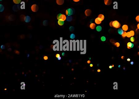 Farblicht bokeh, buntem Glanz auf schwarzem Hintergrund, Überlagerungsschicht. Stockfoto