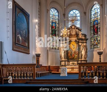 Helligaandskirken, Die Heilig-Geist-Kirche. Die Lutherische Pfarrkirche ist eine der ältesten Kirchen in Kopenhagen, Dänemark. Innenraum und Altar Stockfoto