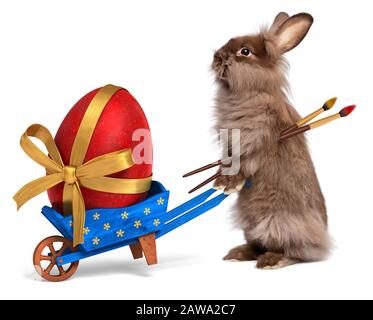 Süßes Osterhase Kaninchen mit einem kleinen blauen Schubkarren und einem roten Osterei mit goldenem Band, isoliert auf Weiß, CG und Foto Stockfoto