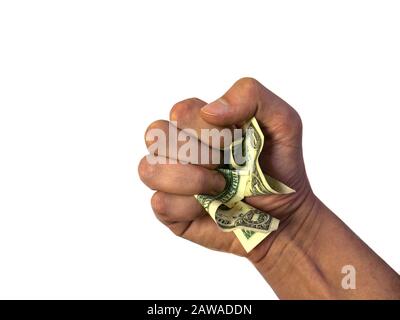 Die Hand hält und drückt die Dollar. Stockfoto