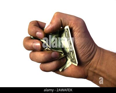 Die Hand hält und drückt die Dollar. Stockfoto