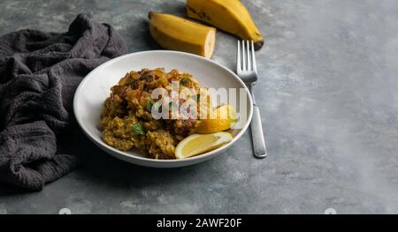 Fufu de platano verde maduro, Tacaho, Mofongo, gestampfte Kochbananen mit Schweinefleisch, Zwiebel. Puerto Rico. Amazonische Küche, Peru, Kuba Stockfoto