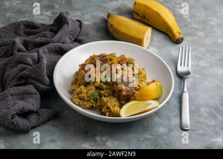 Fufu de platano verde maduro, Tacaho, Mofongo, gestampfte Kochbananen mit Schweinefleisch, Zwiebel. Puerto Rico. Amazonische Küche, Peru, Kuba Stockfoto