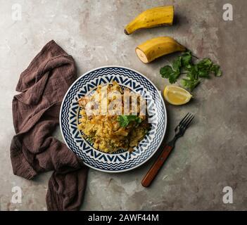 Fufu de platano verde maduro, Tacaho, Mofongo, gestampfte Kochbananen mit Schweinefleisch, Zwiebel. Puerto Rico. Amazonische Küche, Peru, Kuba Stockfoto