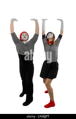 Ein paar Mimes in Aktion. Mann und Frau, die eine Pantomime durchführen Stockfoto