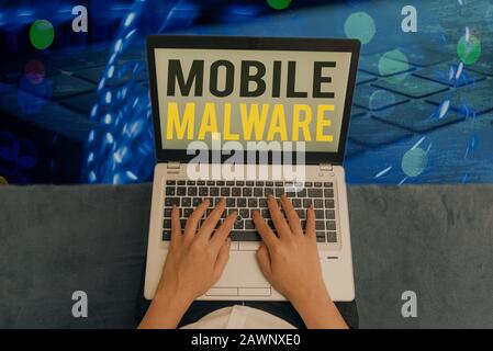 Handschriftertext Mobile Malware. Schädliche Software für konzeptionelle Fotos, die auf mobile Geräte angreift Stockfoto