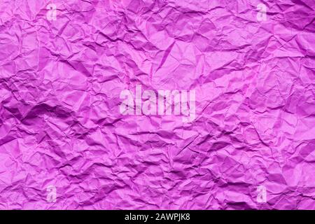 Rosa zerknittertes Papier Hintergrund Stockfoto
