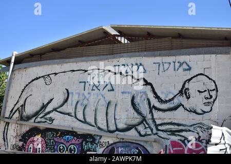 Hungerndes Monster Graffiti an einer Wand in Florentin Tel Aviv Stockfoto