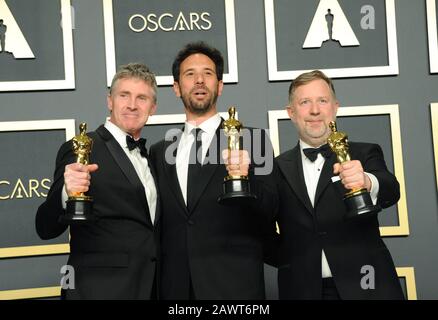 Los Angeles, Kalifornien. Februar 2020. Dominic Tuohy, Guillaume Rocheron, Greg Butler im Presseraum der 92. Academy Awards - Presseraum, Dolby Theatre in Hollywood and Highland Center, Los Angeles, CA 9. Februar 2020. Credit: Elizabeth Goodenough/Everett Collection/Alamy Live News Stockfoto